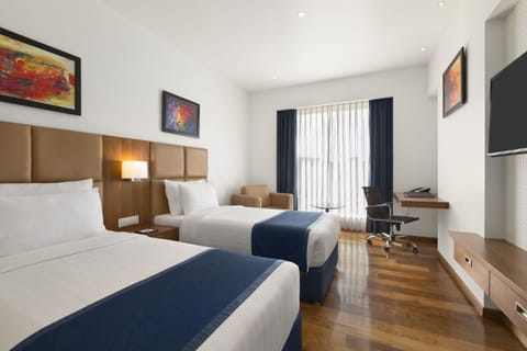 Deluxe Room, 1 Twin Bed, Non Smoking | Premium bedding, memory foam beds, minibar, in-room safe