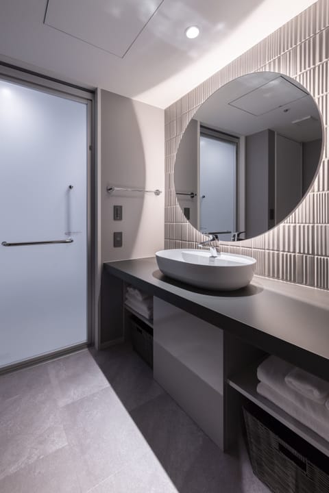 Family Quadruple Room | Bathroom | Combined shower/tub, deep soaking tub, free toiletries, hair dryer