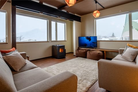Ni Apartment | Living area | Flat-screen TV, fireplace