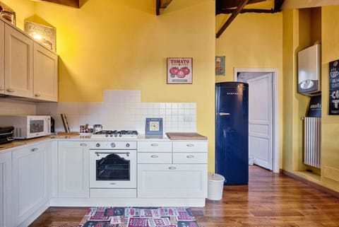 Studio | Private kitchenette | Full-size fridge, microwave, oven, dishwasher