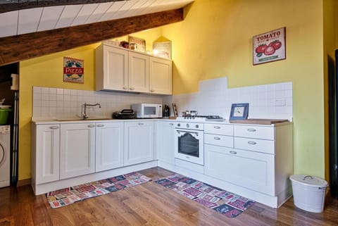 Studio | Private kitchenette | Full-size fridge, microwave, oven, dishwasher