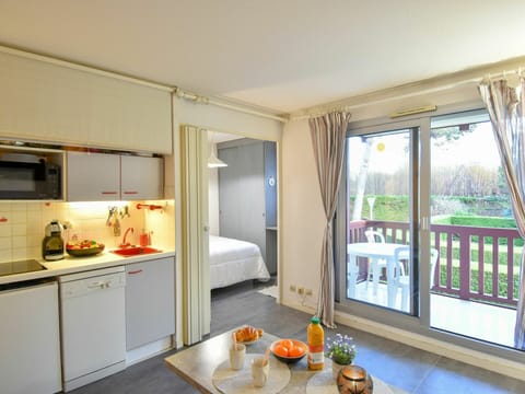 Cabinetry, Plant, Wood, Countertop, Table, Window, Tableware, Interior Design, Floor, Flooring