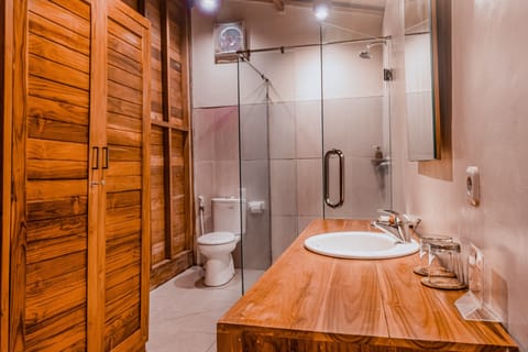 Joglo House | Bathroom | Separate tub and shower, free toiletries, hair dryer, bathrobes