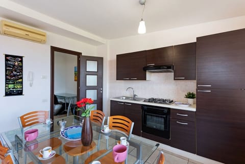 Apartment, 2 Bedrooms | Private kitchenette | Full-size fridge, oven