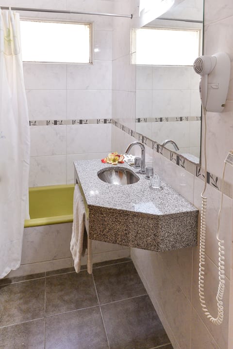 Standard Triple Room | Bathroom | Combined shower/tub, hair dryer, bidet, towels