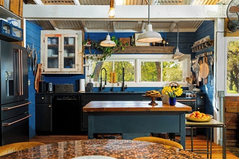 Kitchen with Cafe Appliances - Gas Oven, Fridge, Dishwasher and double sink