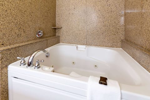 Superior Studio Suite, 1 King Bed, Non Smoking | Bathroom | Combined shower/tub, deep soaking tub, hydromassage showerhead