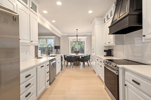 Off of the sitting room is our newly renovated kitchen - featuring top-of-the-line appliances, cooking utensils, a Keurig coffee maker, and all other essentials you'll need during your stay!