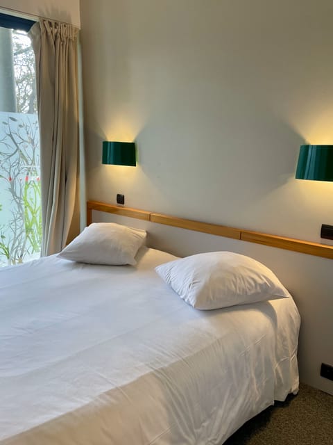 Classic Room | Premium bedding, down comforters, Select Comfort beds, soundproofing