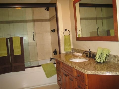 One Bedroom Condo | Bathroom | Combined shower/tub, hair dryer, bathrobes, towels
