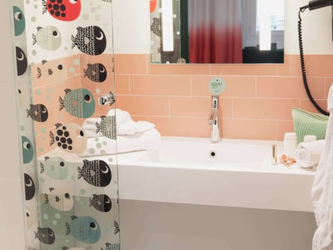 Shower, eco-friendly toiletries, hair dryer, towels