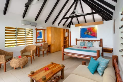 Beachfront Bure  | Premium bedding, in-room safe, individually decorated, desk