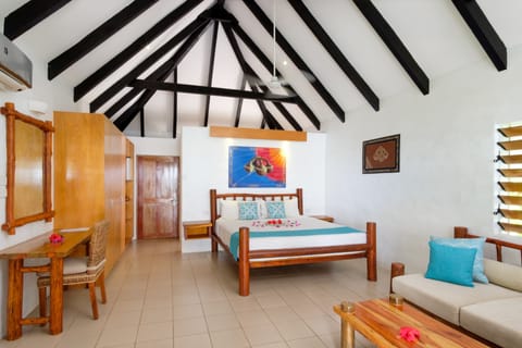 Beachfront Bure  | Premium bedding, in-room safe, individually decorated, desk