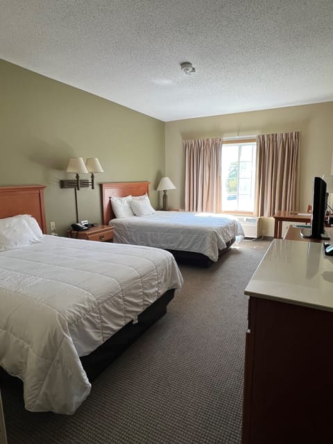 Room, 2 Queen Beds | Premium bedding, individually furnished, laptop workspace