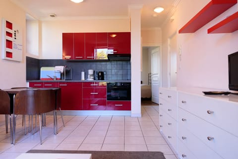 Apartment, 1 Bedroom | Living area | 80-cm flat-screen TV with digital channels, TV