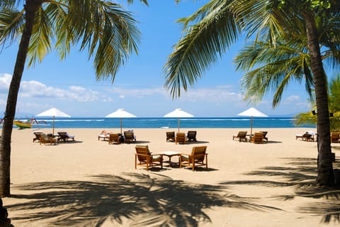 On the beach, white sand, free beach cabanas, sun loungers
