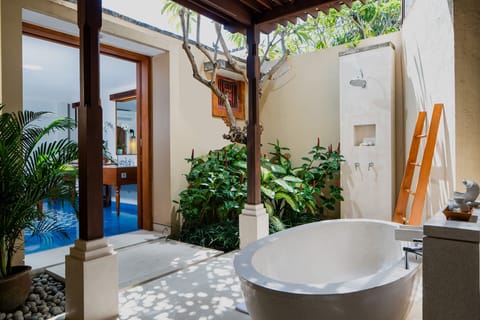 Executive Bungalow, Garden Area | Deep soaking bathtub