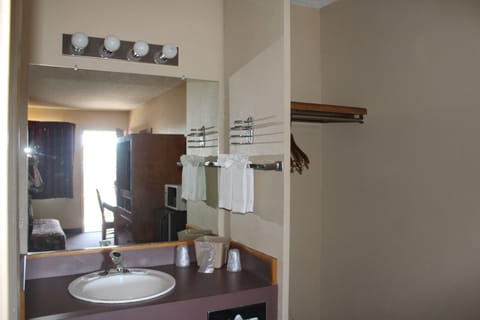 Standard Room, 2 Queen Beds | Desk, blackout drapes, iron/ironing board, free WiFi