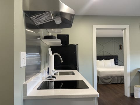 Premium Suite, 1 King Bed with Sofa bed | Private kitchen | Mini-fridge, cleaning supplies, paper towels