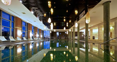 Indoor pool, outdoor pool, pool umbrellas, sun loungers