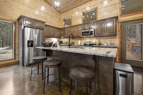 Large cooking kitchen with nice size island.