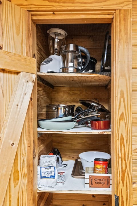 Kitchen cupboard stocked w/ pots, pans, griddle, blender... everything you need.