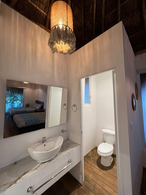 Superior Cabin, 2 Double beds, Lagoon View | Bathroom | Shower, rainfall showerhead, designer toiletries, hair dryer