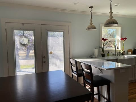 Double doors leading out to 400 sq ft deck.