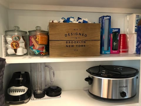 Pantry is stocked with crock pot, blender, coffee supplies and necessary items