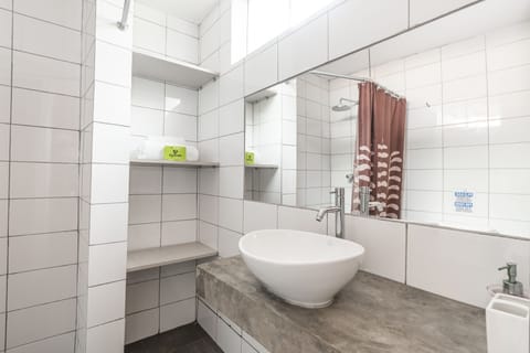 Junior Condo | Bathroom | Shower, free toiletries, towels