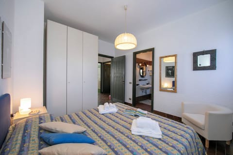 Family Townhome, Multiple Bedrooms, 2 Bathrooms, Mountainside (Residenza La Parusciola) | 3 bedrooms, iron/ironing board, free WiFi, bed sheets