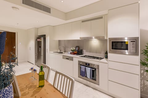 Luxury Apartment | Private kitchen | Full-size fridge, microwave, oven, stovetop