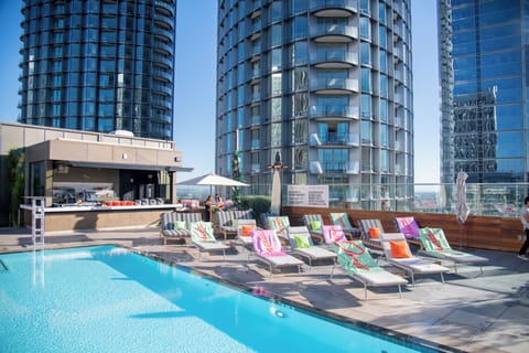 Outdoor pool, open 9:00 AM to 9:00 PM, pool umbrellas, sun loungers