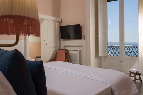 Deluxe Room, Sea View | Premium bedding, down comforters, minibar, in-room safe