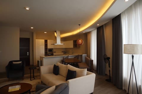 Luxury Apartment | Living area | Flat-screen TV