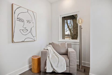 Enjoy our cozy corner at the top of the stairs, perfect for reading a book.