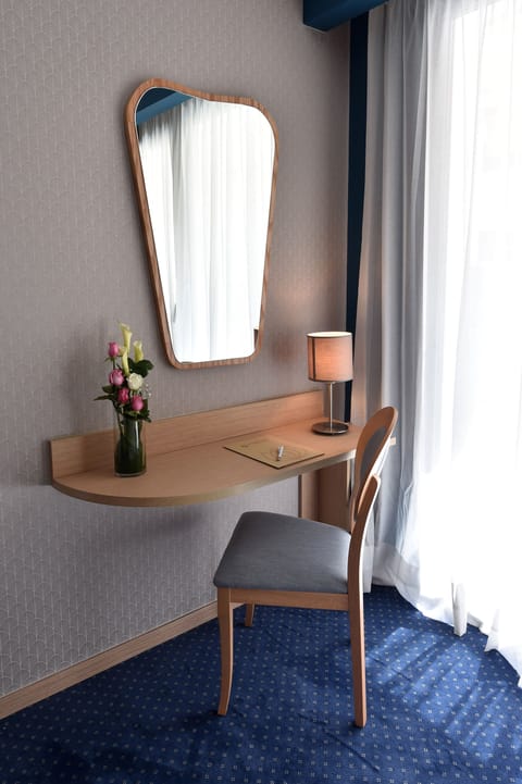 Superior Double or Twin Room | Minibar, in-room safe, desk, laptop workspace