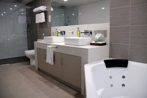  One Bedroom Spa Apartment  | Bathroom | Shower, rainfall showerhead, eco-friendly toiletries, hair dryer