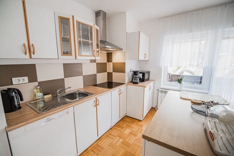 Apartment (One bedroom Apartment 1) | Private kitchen | Fridge, microwave