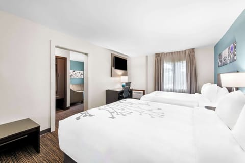 Suite, Multiple Beds, Non Smoking | Premium bedding, individually furnished, desk, blackout drapes