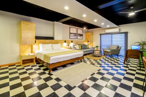 Deluxe Suite | Premium bedding, memory foam beds, in-room safe, laptop workspace