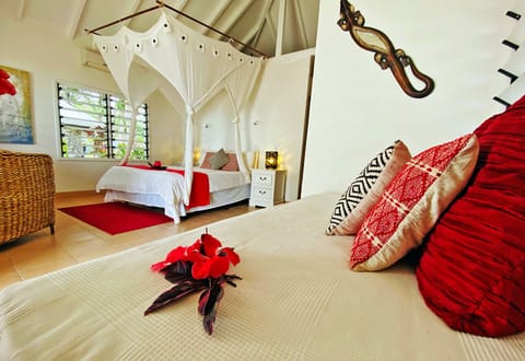 Beachfront Bliss Fare | Individually decorated, rollaway beds, free WiFi, bed sheets