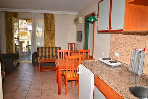 Apartment | Private kitchen | Fridge, stovetop, cookware/dishes/utensils