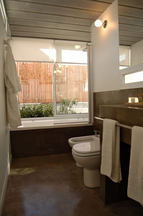Loft | Bathroom | Designer toiletries, hair dryer, bathrobes, bidet