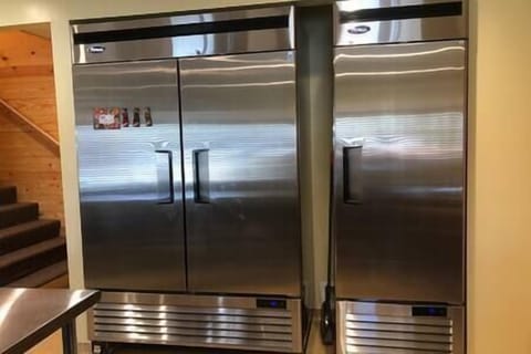 Commercial refrigerator and freezer in Lodge. Plenty of room for drinks, dinners and produce.