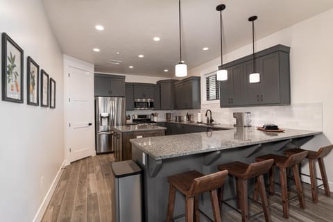 Brand new kitchen with island and additional seating for 4