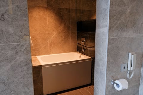 Mint Suite | Bathroom | Shower, rainfall showerhead, free toiletries, hair dryer