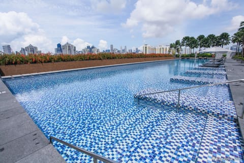 Outdoor pool, pool umbrellas, sun loungers