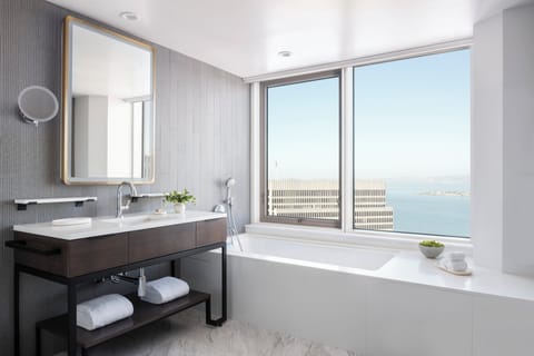 Suite, 1 King Bed, Bay View, Corner | Bathroom | Designer toiletries, hair dryer, bathrobes, slippers