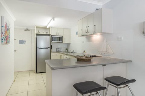 One Bedroom Apartment | Private kitchen | Full-size fridge, microwave, stovetop, dishwasher